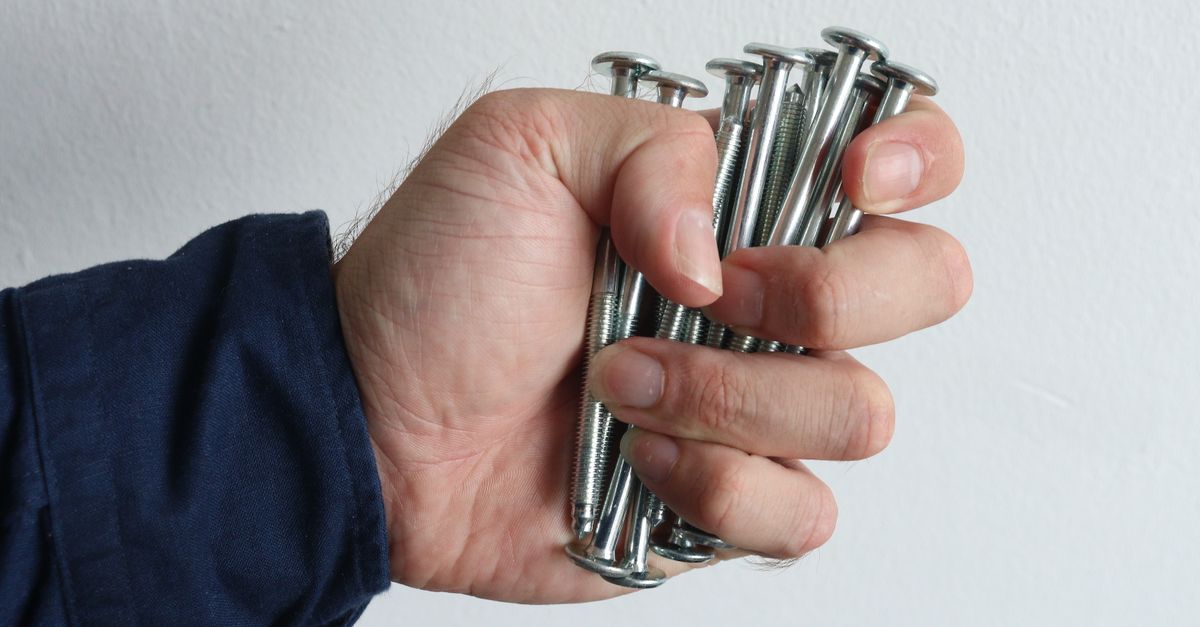 Structural Analysis: The Auto-Locking Spring Mechanism